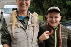 Beate and Brian Byrne of Byrne's Moble Zoo with bearded dragons and a snake at Aonacj Jack in Meenaleck.