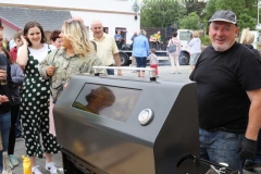 Hughie Mc Bride cooking uo the burgers at Aonach Jack in Meenaleck.