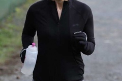 Michelle Bashford crossing the finish line at the 200th Dungloe Parkrun.