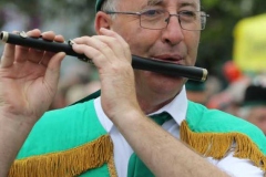 Eamon Rodgers of the Annagry band keeping in tune at the Mary parade. (Photos by Eoin Mc Garvey)