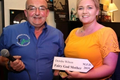 Kevin Bonner making a presentation this week to Deirdre Wilson who is one of the chaperones for the Marys at thiis year's festival.